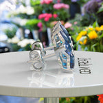 Load image into Gallery viewer, Celestial Beauty: Pear Shaped London Blue Topaz Cluster Earrings.