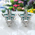 Load image into Gallery viewer, Azure Blossom: Pear Turquoise Gems in Elegant Floral Cluster Earrings.