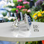 Load image into Gallery viewer, Deep Blue Radiance: Double Halo London Blue Topaz Stud Earrings.