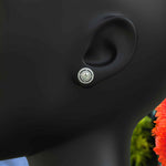 Load image into Gallery viewer, Celestial Glow: Colorless Moissanite Round Stud Earrings with Double Halo.