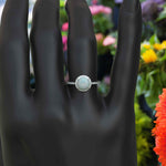 Load image into Gallery viewer, Cosmic Beauty: Round Opal Halo Ring in Silver Setting