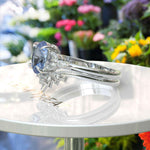 Load image into Gallery viewer, Elegance Redefined: Oval Blue Moissanite Ring Set & Marquise Moissanite Highlights