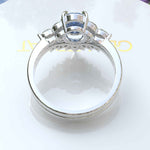 Load image into Gallery viewer, Elegance Redefined: Oval Blue Moissanite Ring Set & Marquise Moissanite Highlights