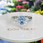 Load image into Gallery viewer, Elegance Redefined: Oval Blue Moissanite Ring Set & Marquise Moissanite Highlights