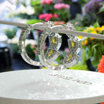 Load image into Gallery viewer, Sunkissed Gleam: Pear Citrine Hoop Earrings with Moissanite Crescent.