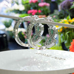 Load image into Gallery viewer, Mystic Meadows: Pear-Cut Moss Agate Hoop Earrings with Moissanite Sparkle.