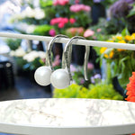 Load image into Gallery viewer, Ocean's Whisper: Timeless Pearl Drop Earrings.