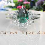 Load image into Gallery viewer, Nuptial Wonders in Verdant: Dive into the Pear Cut Green Emerald Ring Set, Adorned with Marquise Gems