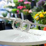 Load image into Gallery viewer, Mesmerizing Tides: Cyan Blue Moissanite Hoop Earrings with Baguette Cut.