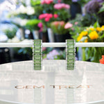 Load image into Gallery viewer, August's Radiance: Sleek Baguette Peridot Hoop Earrings.