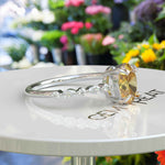 Load image into Gallery viewer, Sunny Elegance: Oval Yellow Sapphire Ring Adorned with Marquise Moissanite Accents