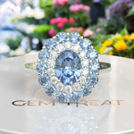 Load image into Gallery viewer, Stunning Oval Blue Moissanite Surrounded by Glistening Double Halo Ring