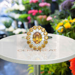Load image into Gallery viewer, Dual Luster: Elegant Oval Citrine Ring Flanked by Moissanite & Citrine Halo