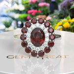 Load image into Gallery viewer, Whispers of Romance: Discover the Lustrous Oval Halo Garnet within This Ring Design