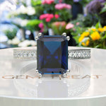 Load image into Gallery viewer, Deep Blue Majesty: 4.0ct Emerald Cut London Blue Topaz Ring.