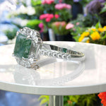 Load image into Gallery viewer, Earthly Enigma: Square Moss Agate and Moissanite Baguette Halo Ring.