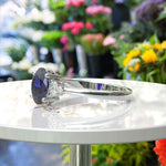 Load image into Gallery viewer, Twilight Dream: Stunning Oval Blue Sapphire Ring with Moissanite Companions.