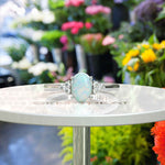 Load image into Gallery viewer, Classic Oval Opal Ring with Lustrous Moissanite Side Stones