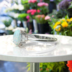 Load image into Gallery viewer, Classic Oval Opal Ring with Lustrous Moissanite Side Stones