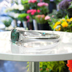 Load image into Gallery viewer, Garden of Radiance: Deep Green Cushion-Cut Emerald with Dazzling Moissanite Edges.
