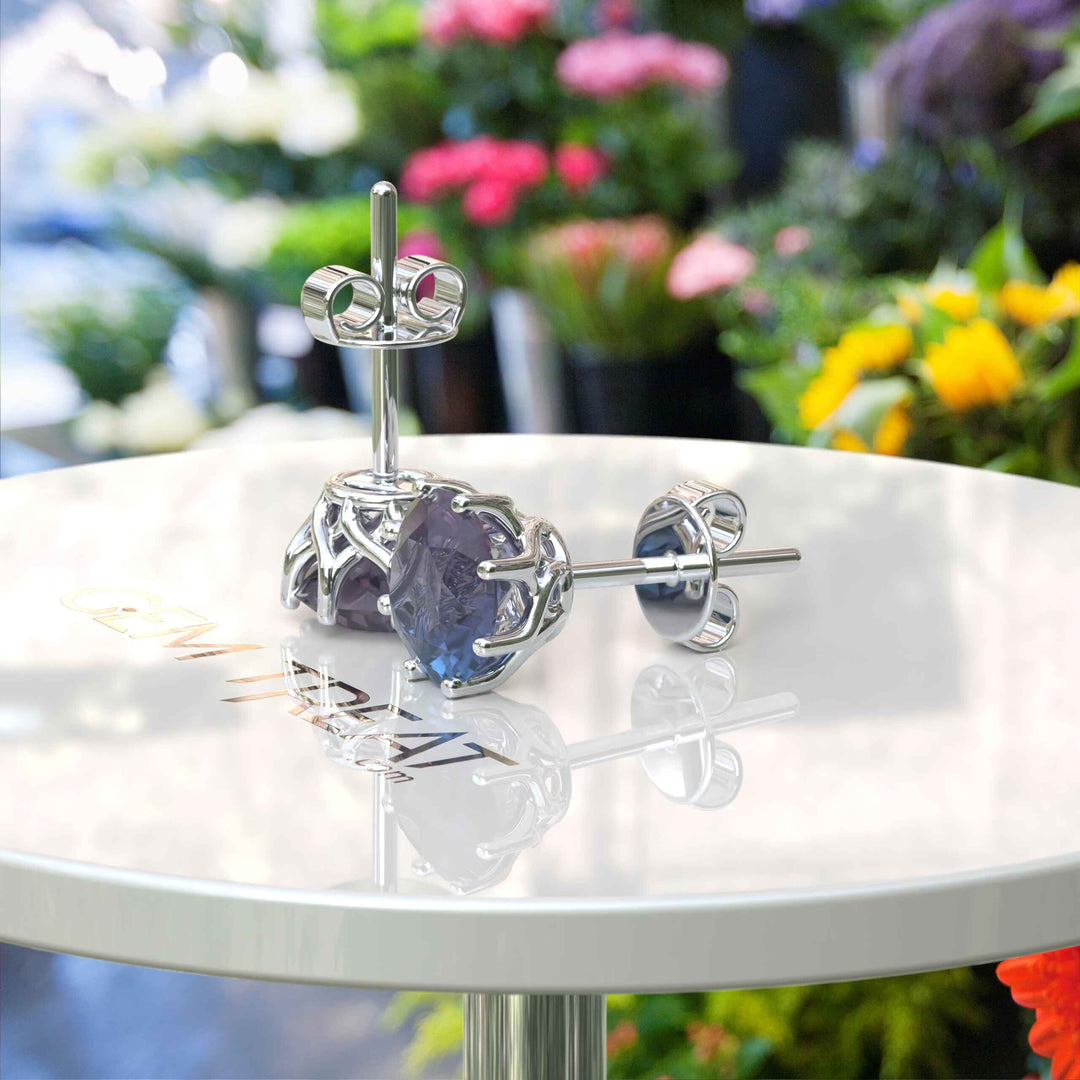 Mesmeric Hues: Round Alexandrite Stud Earrings for Every Light.