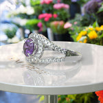 Load image into Gallery viewer, Purple Majesty: Silver Halo Ring Featuring a Brilliant 1ct Round Amethyst Centerpiece
