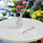 Load image into Gallery viewer, Love Embodied in Heart Shape Champagne Moissanite Pendant Necklace with Halo Accent
