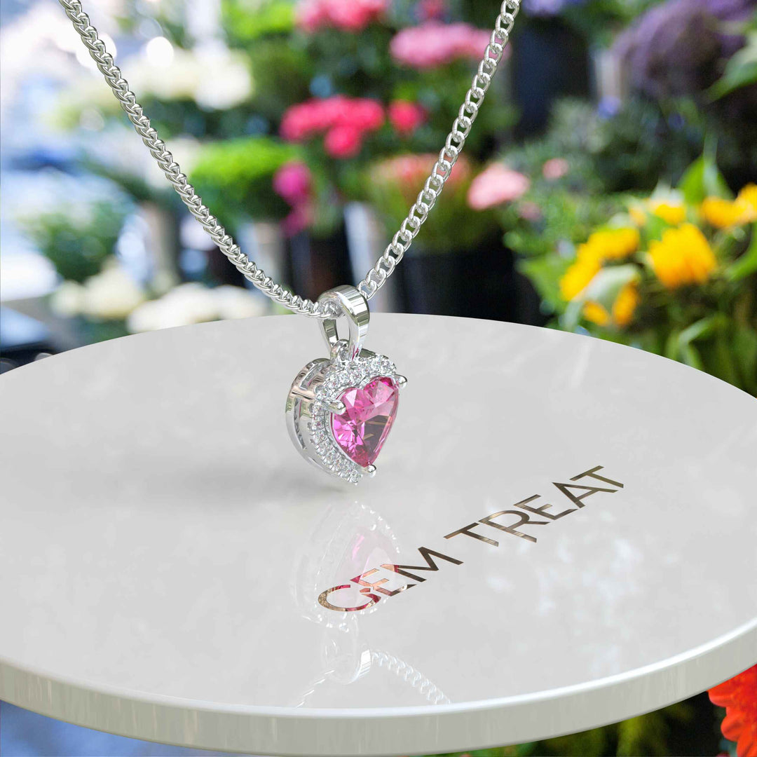 Romantic Allure: Gleaming Heart Shape Pink Sapphire Pendant Necklace, Kissed by Moissanite Halo