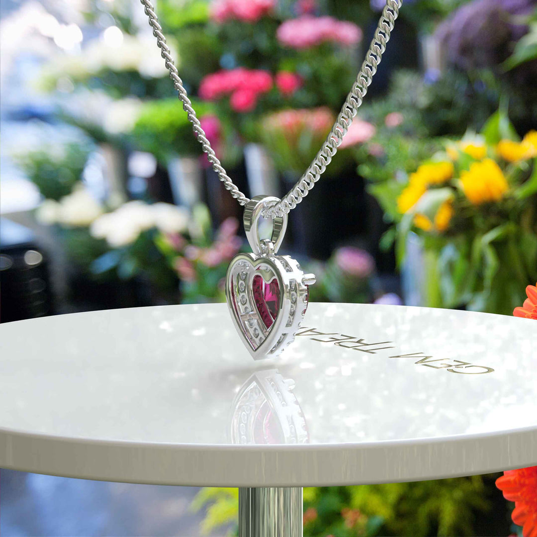 Romantic Radiance: Heart Shape Ruby Pendant Necklace Encased in Moissanite Halo