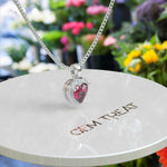 Load image into Gallery viewer, Romantic Radiance: Heart Shape Ruby Pendant Necklace Encased in Moissanite Halo
