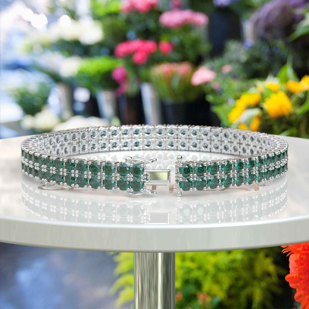 Enchanted Gleam: 12.0ct Round Green Emerald Tennis Bracelet Elegance