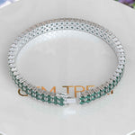 Load image into Gallery viewer, Enchanted Gleam: 12.0ct Round Green Emerald Tennis Bracelet Elegance
