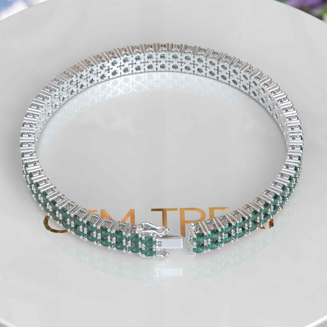 Enchanted Gleam: 12.0ct Round Green Emerald Tennis Bracelet Elegance