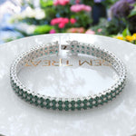 Load image into Gallery viewer, Enchanted Gleam: 12.0ct Round Green Emerald Tennis Bracelet Elegance
