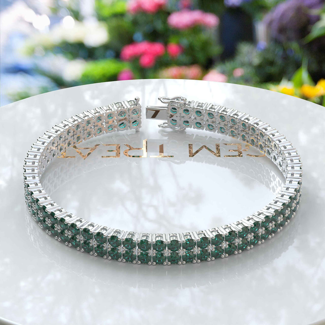 Enchanted Gleam: 12.0ct Round Green Emerald Tennis Bracelet Elegance