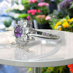 Load image into Gallery viewer, Violet Allure: Lustrous Silver Ring with 1ct Round Amethyst and Radiant Moissanite Halo Accents
