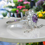 Load image into Gallery viewer, Violet Allure: Lustrous Silver Ring with 1ct Round Amethyst and Radiant Moissanite Halo Accents
