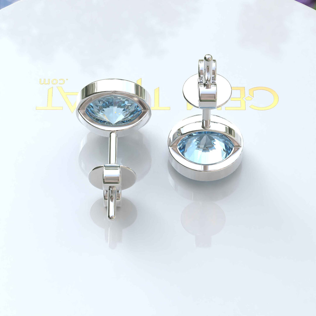 Ocean Bliss: Classic Round Aquamarine Stud Earrings in Sleek Bezel Setting.