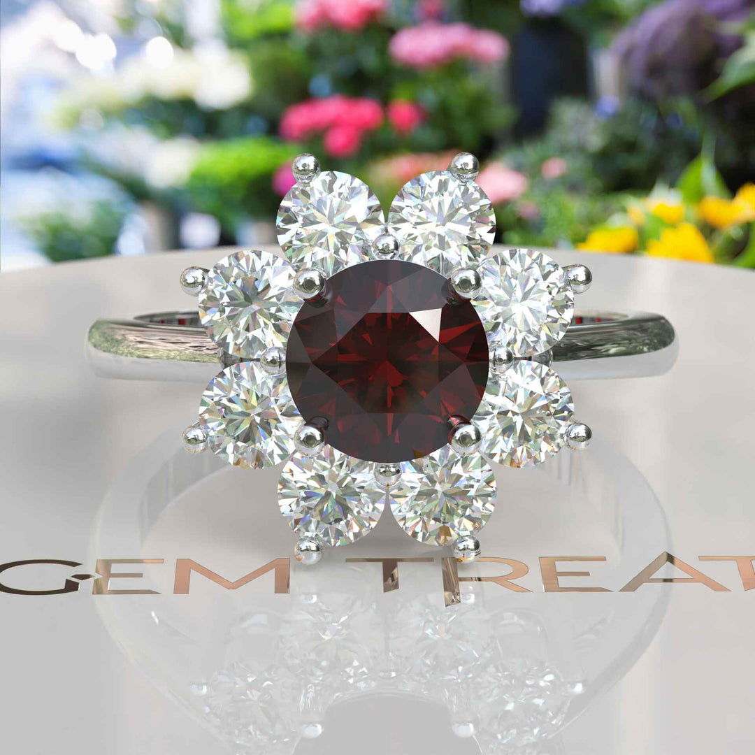 Velvety Vermilion: Round Garnet Ring Accented with Moissanite Halo