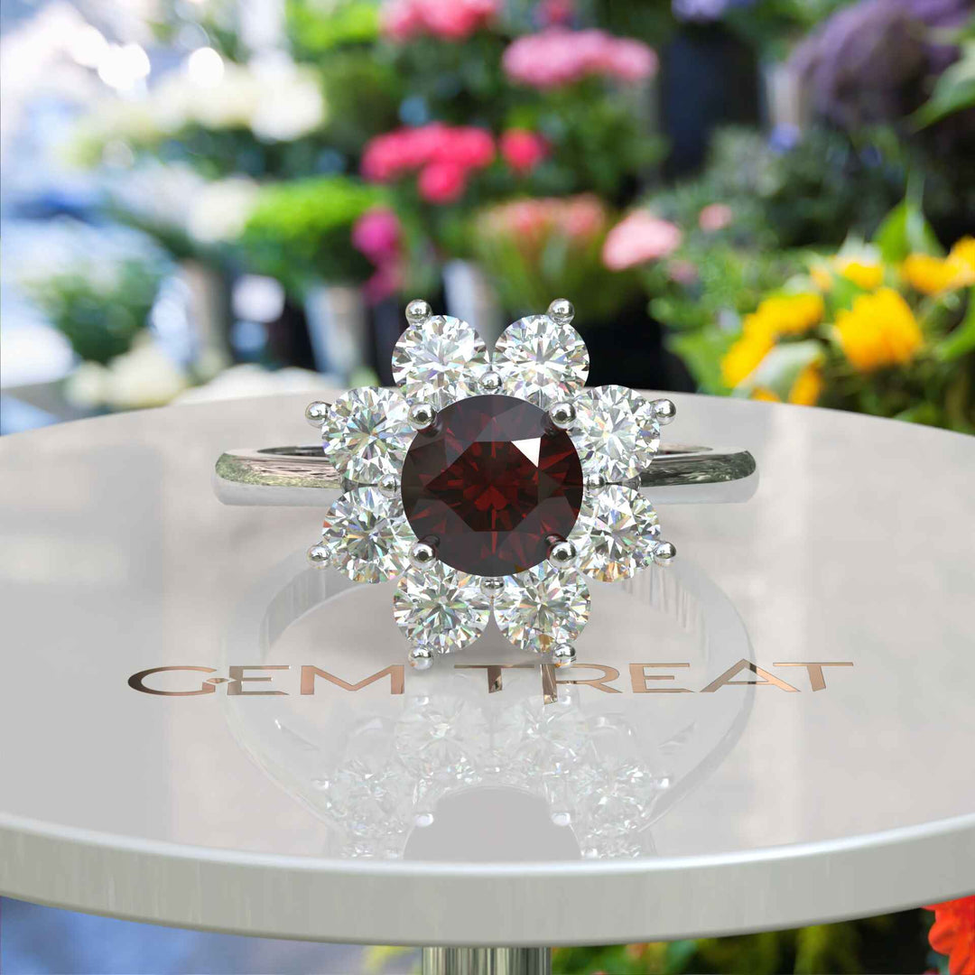 Velvety Vermilion: Round Garnet Ring Accented with Moissanite Halo