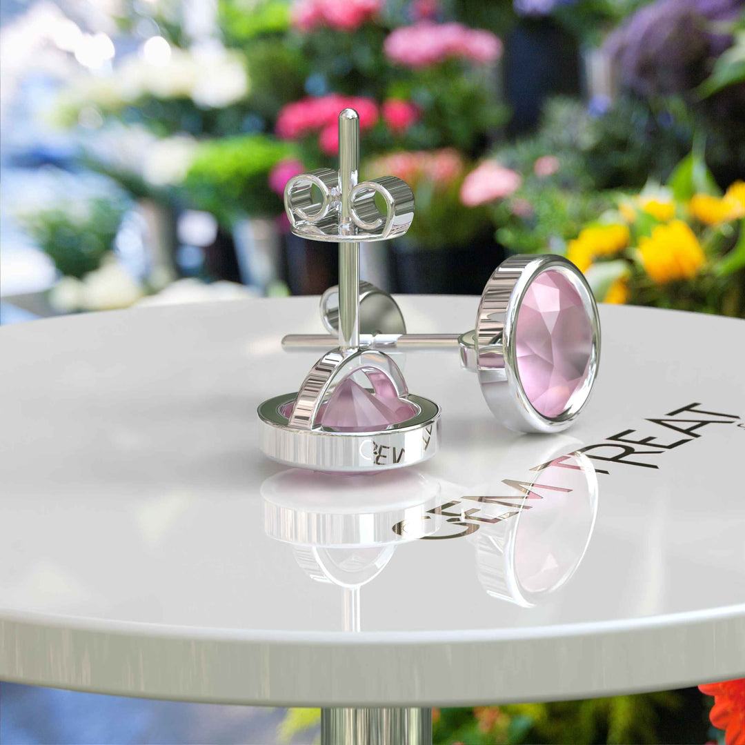 Gentle Radiance: Classic Round Rose Quartz Earrings in Bezel Setting.