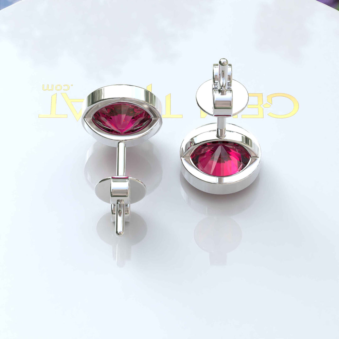 Ruby Radiance: Classic Bezel Set Round Stud Earrings.