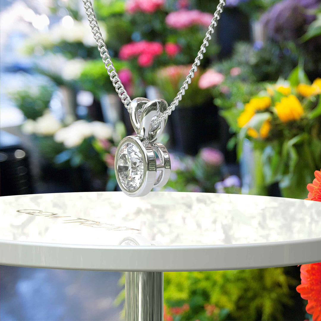 Glistening Gem: Bezel Set, A Round White Moissanite Solitaire Pendant Necklace of Pure Brilliance