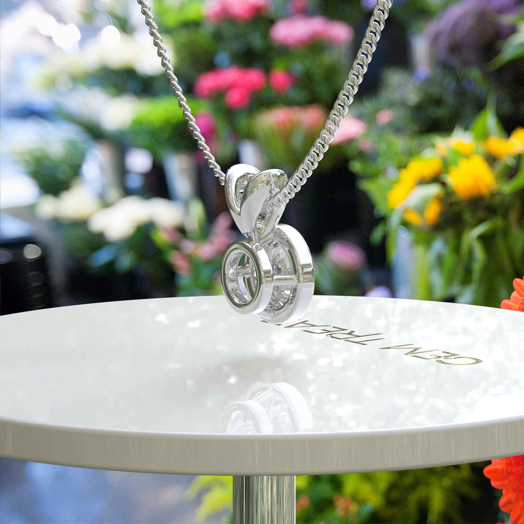 Glistening Gem: Bezel Set, A Round White Moissanite Solitaire Pendant Necklace of Pure Brilliance