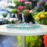 Load image into Gallery viewer, Chic Elegance 3.5mm 8.0ct Turquoise Tennis Bracelet Showcased in Silver Setting
