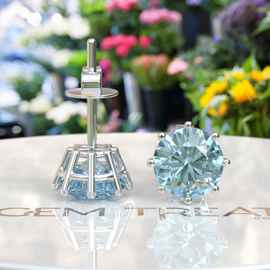 Marine Mirage: Timeless Round Aquamarine Stud Earrings Delights.