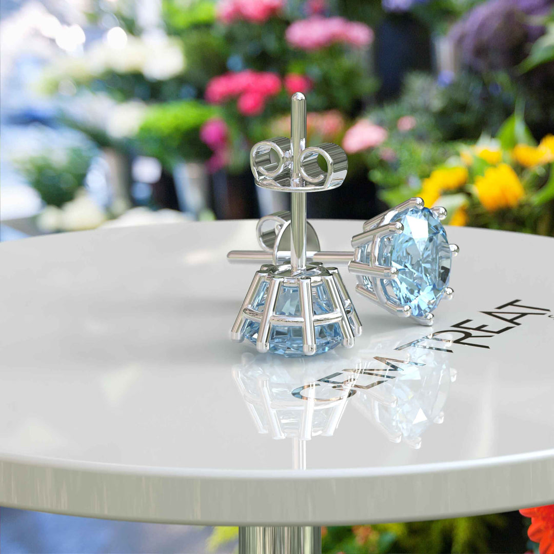 Marine Mirage: Timeless Round Aquamarine Stud Earrings Delights.