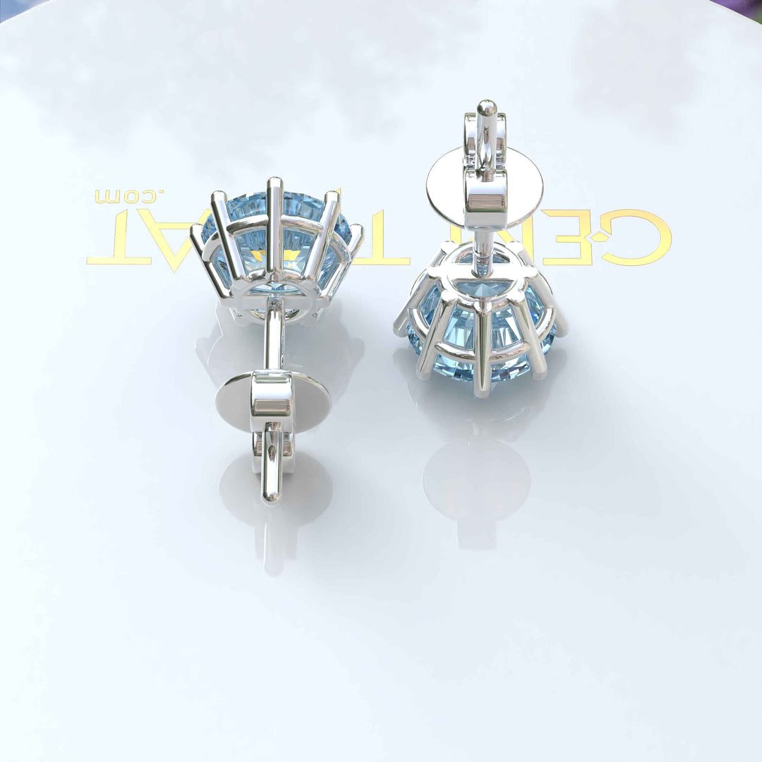 Marine Mirage: Timeless Round Aquamarine Stud Earrings Delights.