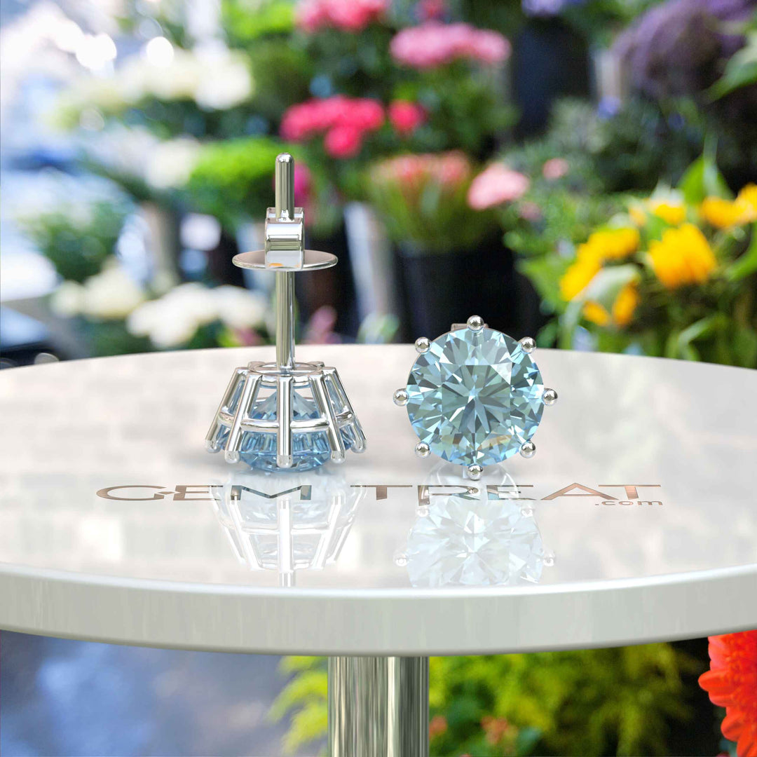 Marine Mirage: Timeless Round Aquamarine Stud Earrings Delights.