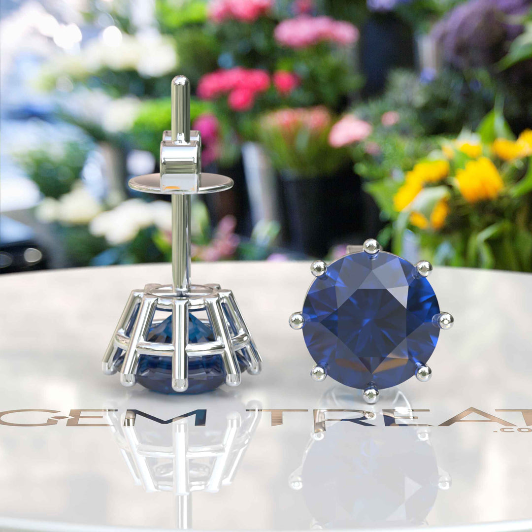 Enigmatic Blues: Timeless Elegance with Classic Round London Blue Topaz Stud Earrings